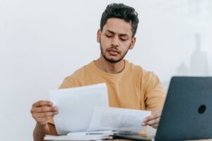 man reviewing documents